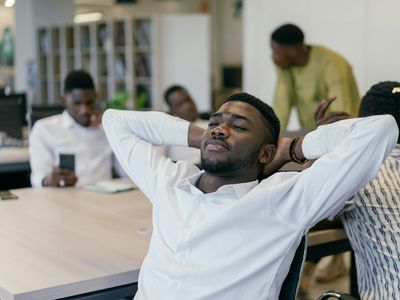 Office employee taking a break for mobility exercises